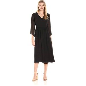 James & Erin black midi dress with flowing sleeves